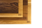 High-quality wooden cutting boards with NXT Board logo, sustainable and ideal for the kitchen