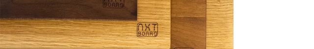 Sustainable wooden cutting boards with NXT BOARD logo, various types of wood and grains